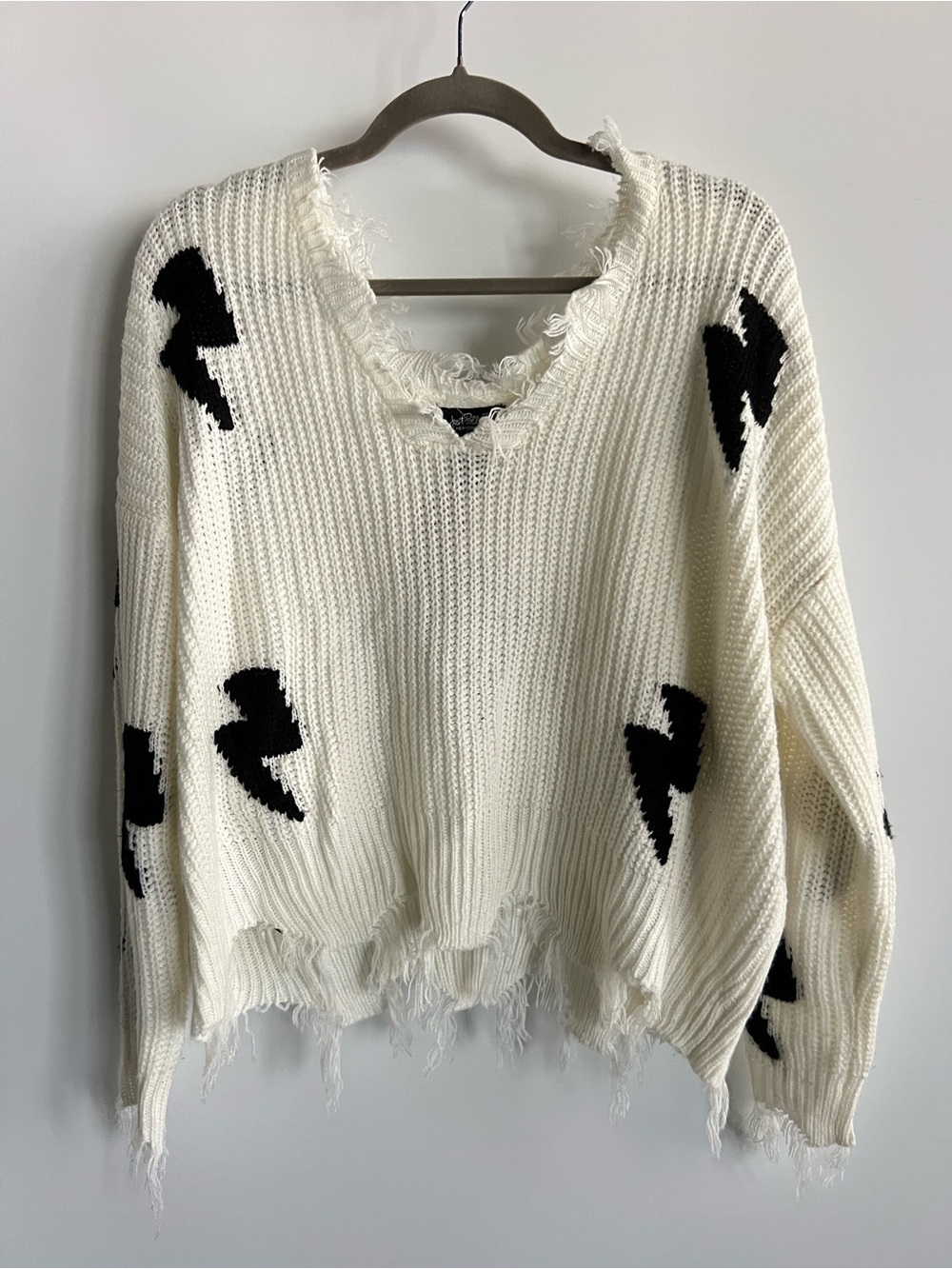 White Distressed Knit Sweater with Black Bolt Motifs